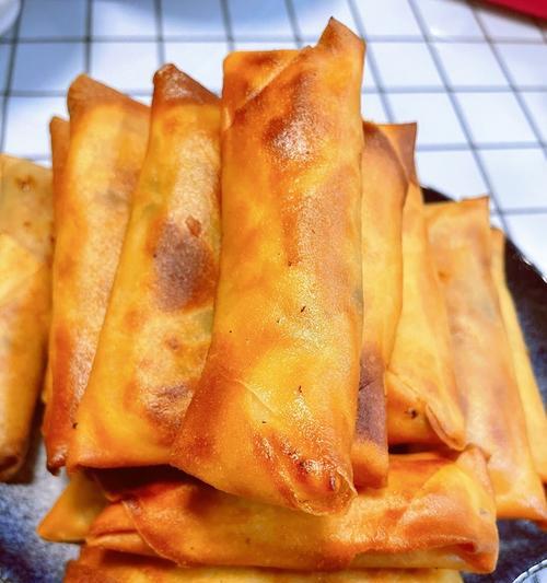 轻松自制什锦春卷（做法详解，让你轻松享受美食盛宴）
