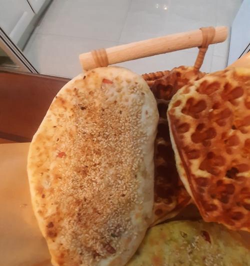 自制烧饼，轻松享受美食之旅（手把手教你制作美味的烧饼，让你成为美食达人）