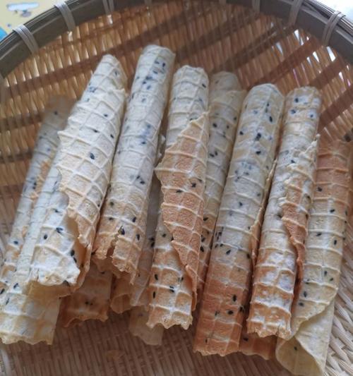 学会做美味的芝麻鸡蛋卷（让你的早餐更美味）