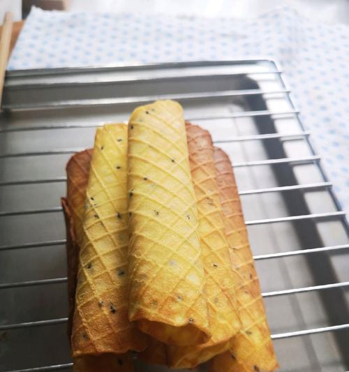 学会做美味的芝麻鸡蛋卷（让你的早餐更美味）