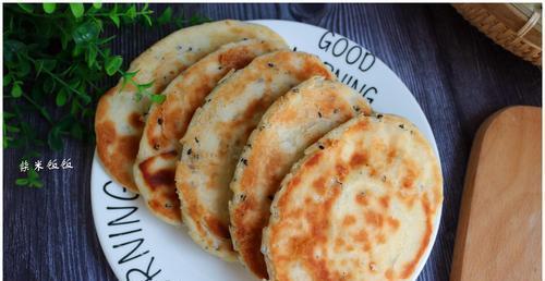 手把手教你制作美味的油层馍（传统小吃的制作方法与技巧详解）