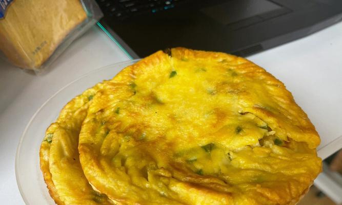 小葱鸡蛋煎饼制作技巧（简单易学的煎饼做法，营养美味的早餐选择）