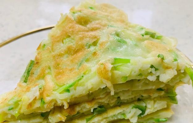 小葱鸡蛋煎饼制作技巧（简单易学的煎饼做法，营养美味的早餐选择）