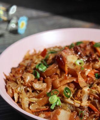 香辣酸菜粉条包的制作方法（在家也能享受美味的小吃）
