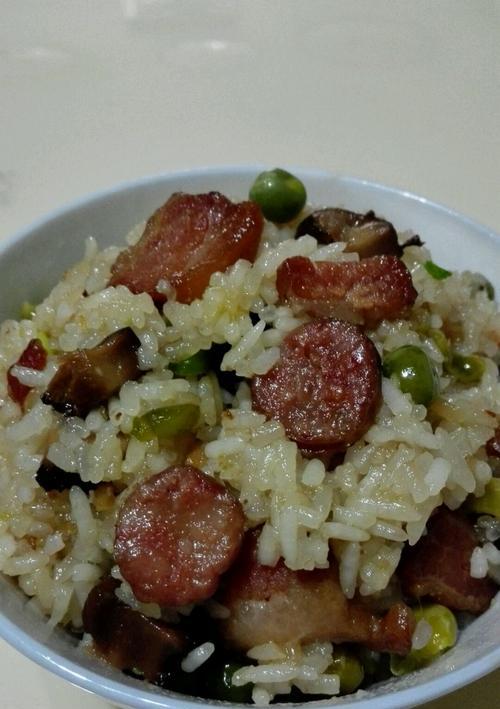 用豌豆腊味糯米饭来尝试新口味（探索豌豆腊味糯米饭的制作方法和美味佳肴）