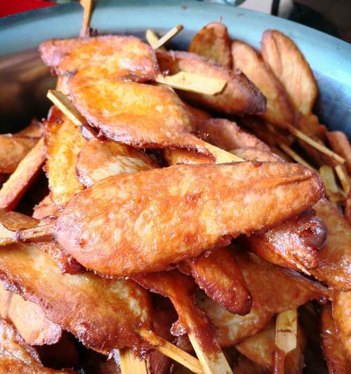 手把手教你做酥脆炸里脊（家庭自制美食的制作方法）