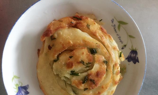三角油饼的制作方法（美味可口的油饼制作秘笈）