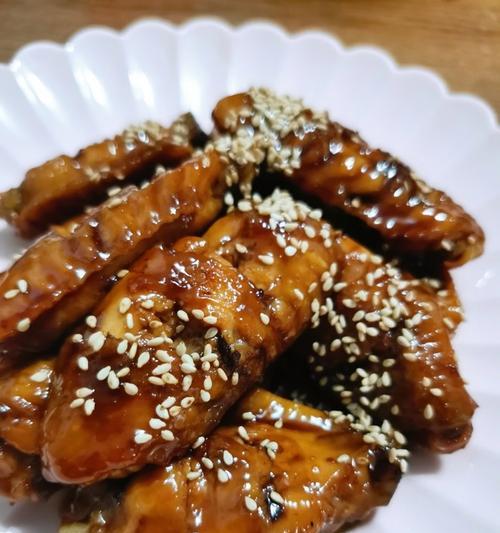瑞士汁鸡翼的烹饪方法（学会如何烹制美味的瑞士汁鸡翼）