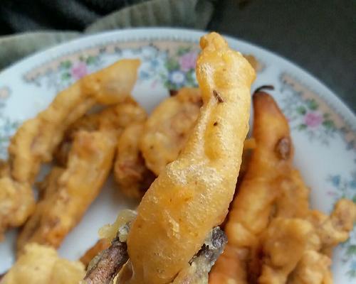 软炸奶豆腐的制作方法与技巧（如何制作口感酥软、外脆内嫩的软炸奶豆腐）