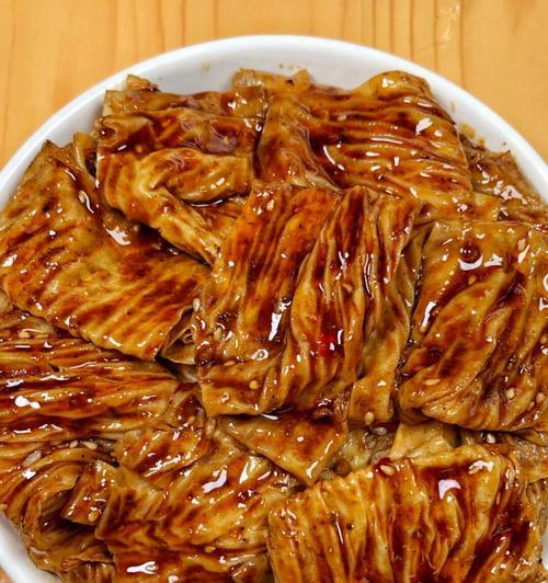 香辣豆腐皮的制作方法（用豆腐皮做出美味佳肴）