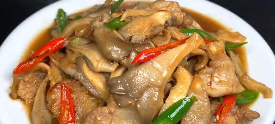 草菇炒瘦肉的做法是什么？如何炒出鲜嫩多汁的草菇瘦肉？