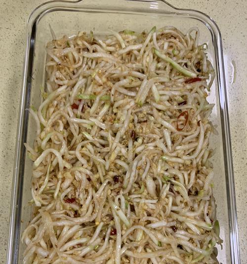 猪肉炒头菜丝的做法是什么？如何炒出美味的头菜丝？