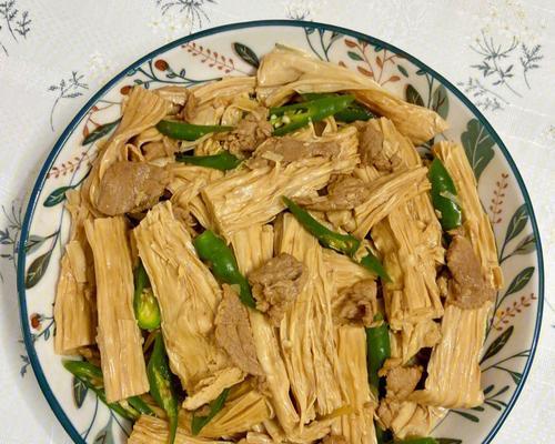 猪肉炒素鸡怎么做？步骤和技巧有哪些？