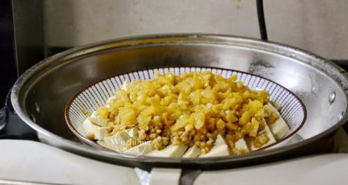 榨菜蒸豆腐怎么做？步骤和技巧有哪些？