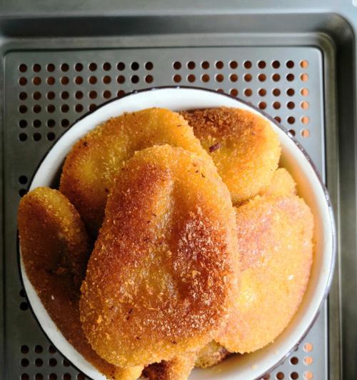 炸芝麻南瓜饼的做法是什么？如何制作出香脆可口的南瓜饼？