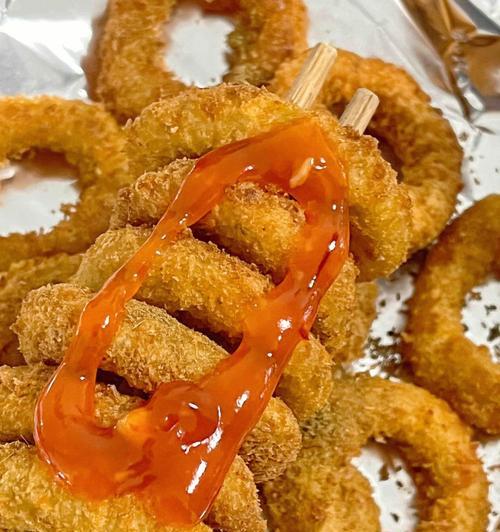 如何在家轻松制作美味的炸洋葱条？炸洋葱条的正确步骤是什么？