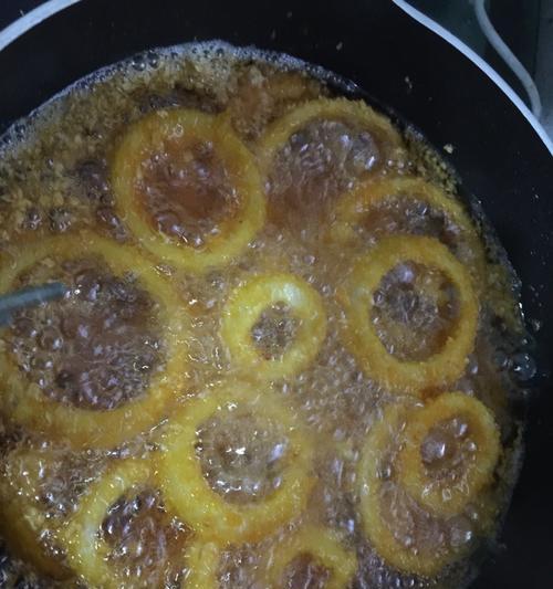 洋葱圈油炸的做法是什么？如何制作出完美的洋葱圈？