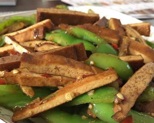 鲜笋炒豆腐干怎么做？步骤和技巧有哪些？
