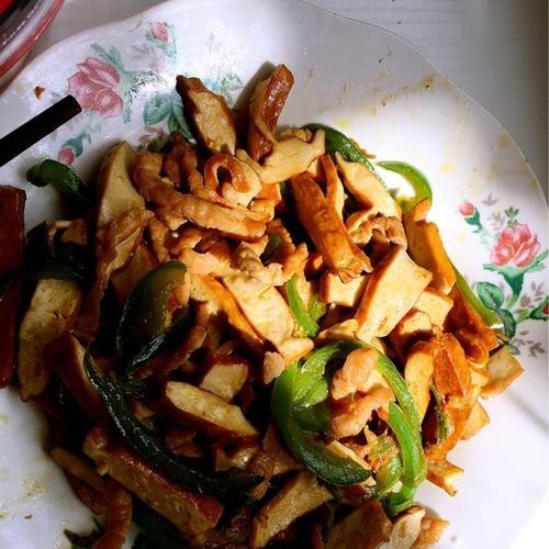 肉丝炒豆腐干怎么做？步骤和技巧有哪些？