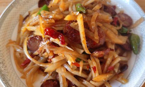 土豆片炒腊肠的做法是什么？如何炒制出美味的土豆片炒腊肠？